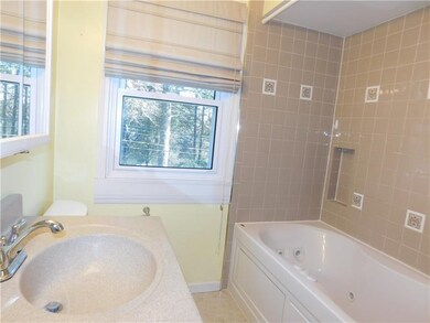 Main level bath features spa amenities with its re