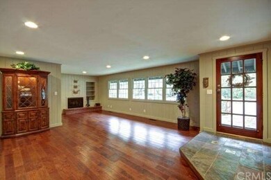 Slate entry, spacious living room with distressed 