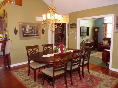 The Dining Room with exotic  hardwood floors can a