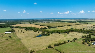 Back View of land; Zoned AG; fenced and cross fenc