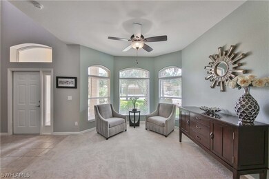 Formal Living Area  ~ Arched Windows Carpeted