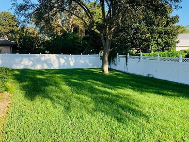 Beautiful Back Yard with Vinyl Fence