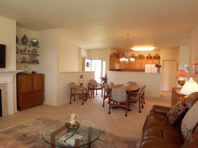 Great room towards foyer and kitchen