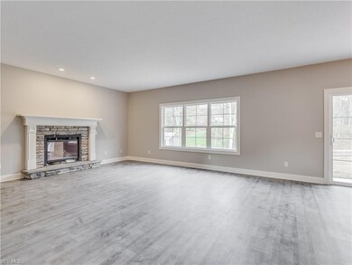 Beautiful stone fireplace with mantel. Luxury viny