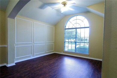 Second living area at front of home, perfect for a study or additional sitting area.