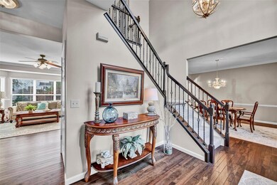 Greet your guests in the impressive 2 story entry 