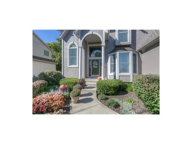 Beautifully landscaped walk-way to welcome your fr