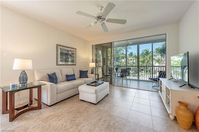 Living area with light tile patterned floors and a