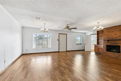 Family Room has a Gas Fireplace with built-in Bookcases on each side.