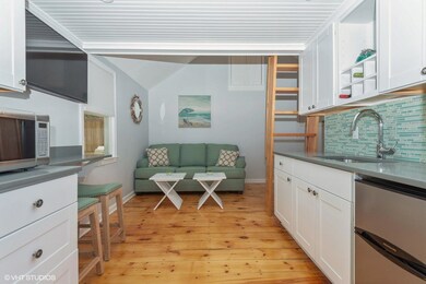 08_1706Rte6A_18_91_KitchenLivingRoom_MLS