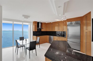 OPEN KITCHEN WITH GRANITE COUNTERS