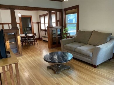 Open living space with gorgeous built in bookcases