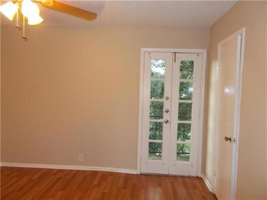 Bedroom. French door onto Balcony at 2nd bedroom