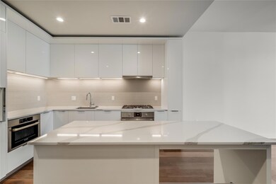 Kitchen featuring stainless steel appliances, mod