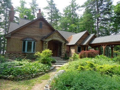 Exterior Front: The lush landscaping...
