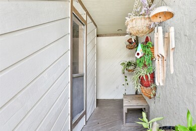 You're looking at a cozy, covered outdoor space wi