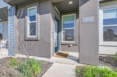 Property entrance with stucco siding