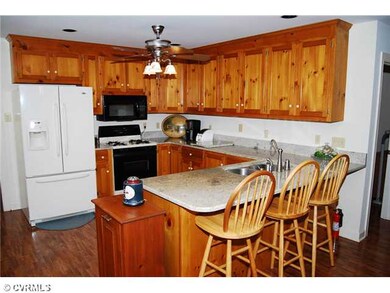 Kitchen - Handsome golden granite CT Tops with gas