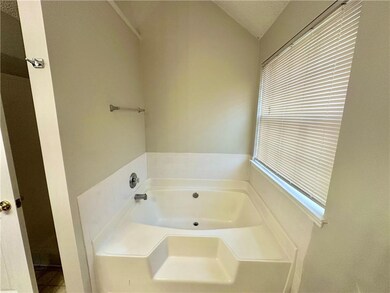 Full bathroom with a bath