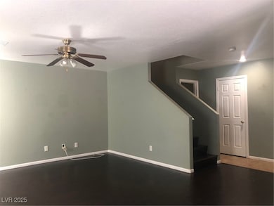 Unfurnished living room with ceiling fan, baseboar
