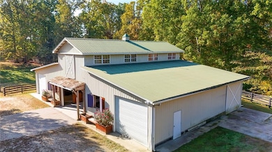 Garage featuring fence