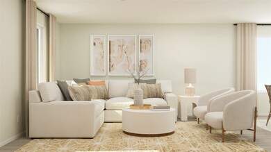 Living area featuring wood finished floors and baseboards