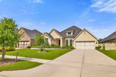 This home features a three-car tandem garage along