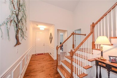 Foyer has Dramatic Ceiling Height, Inviting You in