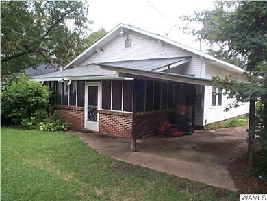 rear view/screened porch/carport