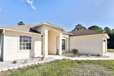 509 Ames St E, Lehigh Acres, FL 33974 - photo 2