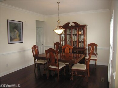 Dining Room. The dining room has plenty of room for your table/furniture and lots of light coming in!