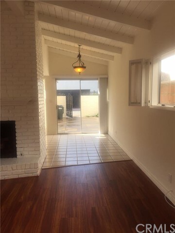 View from living room to kitchen dining area