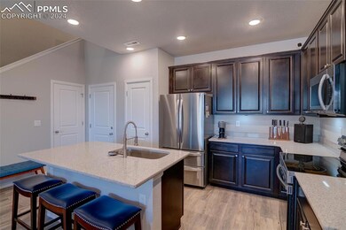Kitchen featuring appliances with stainless steel 