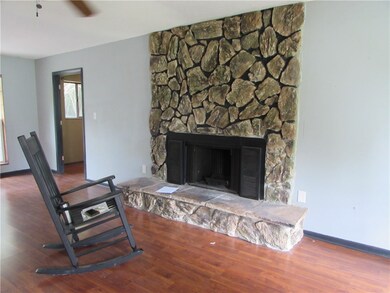 The family room is cozy with a fireplace