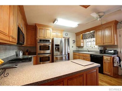 THE STYLISH KITCHEN HAS BEEN REMODELED WITH NEW CA