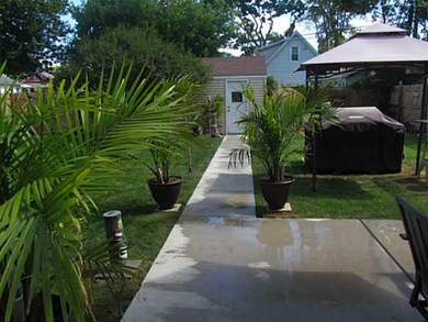 Exterior Back New concrete Patio, walkway and driv