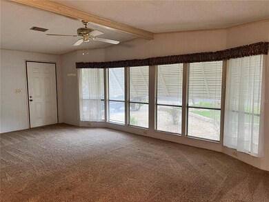 Loads of windows in spacious living room
