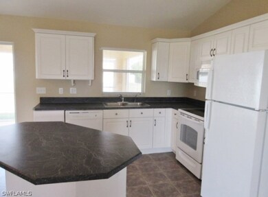 411 NW 20th Terrace, Cape Coral, FL 33993 - photo 3