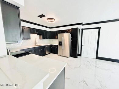 517 Commagere Blvd, Bay Saint Louis, MS 39520 - photo 3