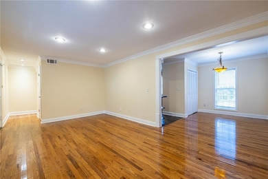 Wood finished floors, and recessed lighting