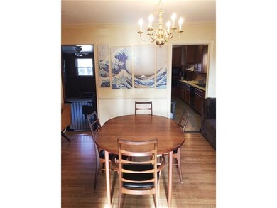 Dining room looking into the kitchen (right) and t