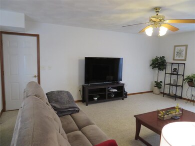 Family room with Garage Exit/Entry Door