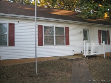 Front Entrance with Flagpole