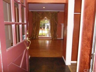 ENTRYWAY WITH WOOD FLOORS