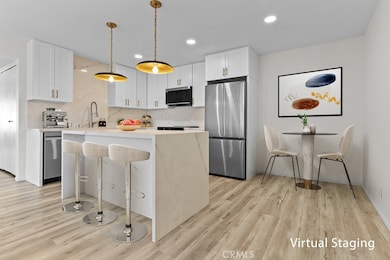 21921 Rimhurst Dr unit 128, Lake Forest, CA 92630 - photo 3