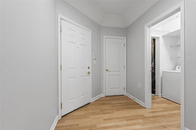 Welcome!  The smaller door is a coat closet ... to