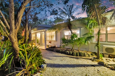 Front of Home with Mature Landscaping