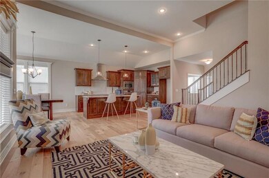GREAT ROOM LOOKING INTO KITCHEN AREA