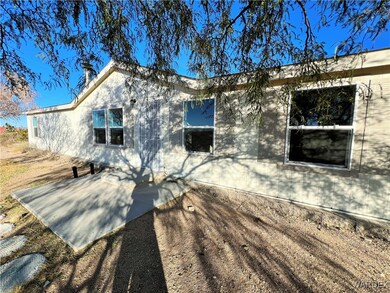 View of side of property featuring a patio