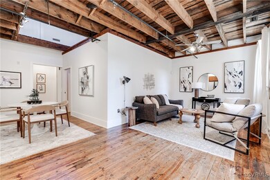 Open living/dining/kitchen.